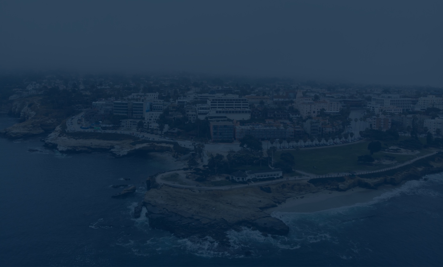 Background image of a coastal city