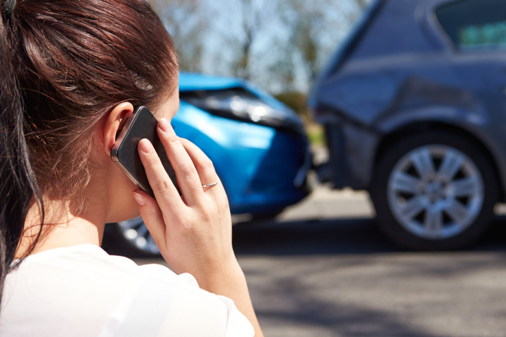 Female Calling A Car Accident Lawyer