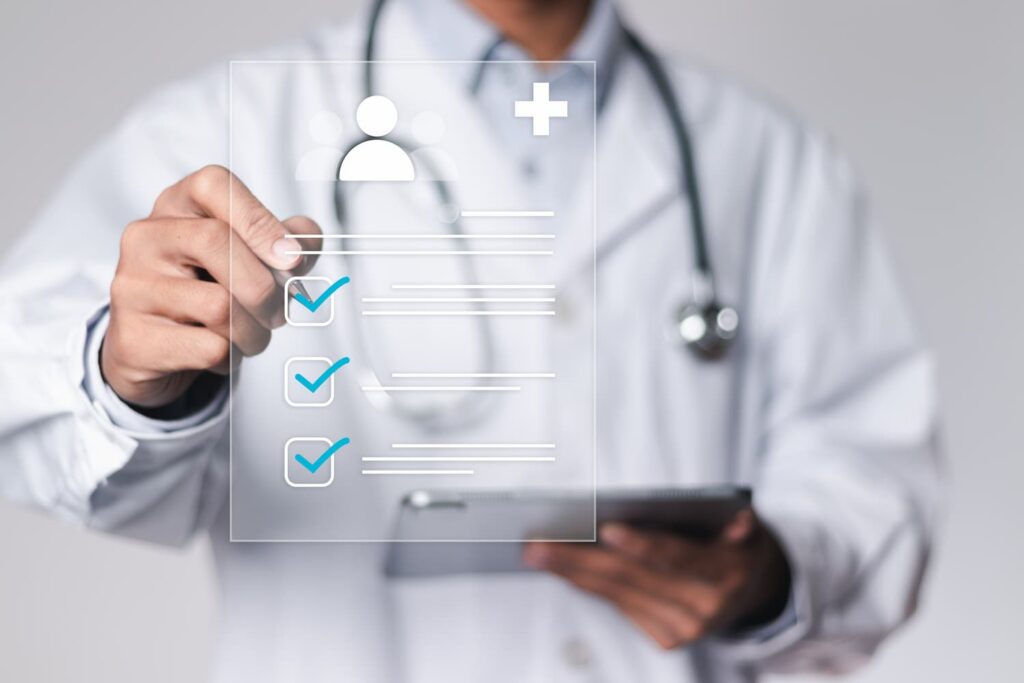 Doctor reviewing medical checklist for motorcycle accident injuries and post-crash evaluation